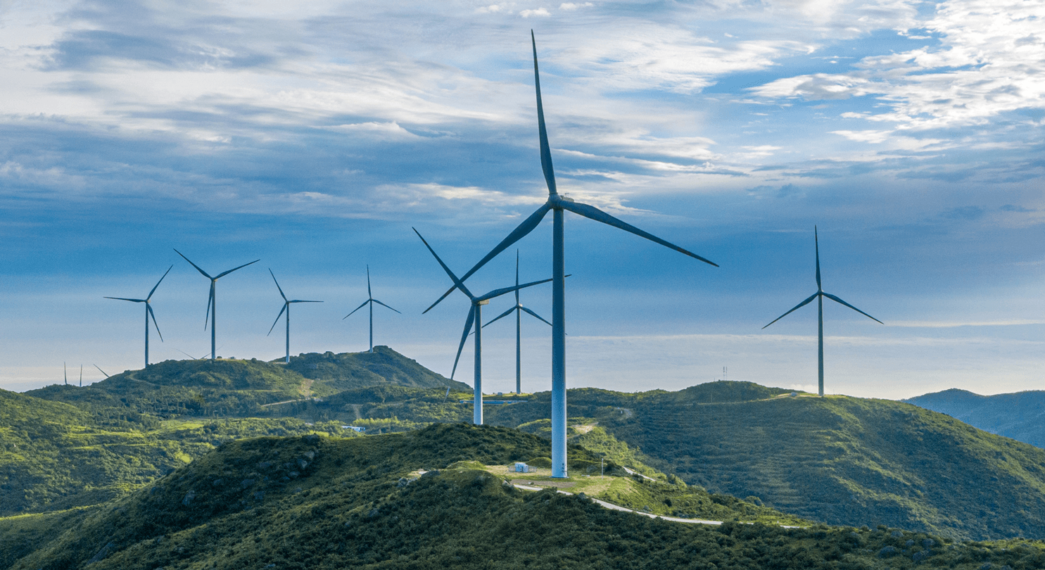 Wind turbines on green hills